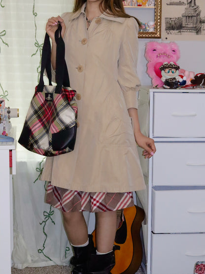 Burberry blue label mid sleeve light tan and cream trench coat