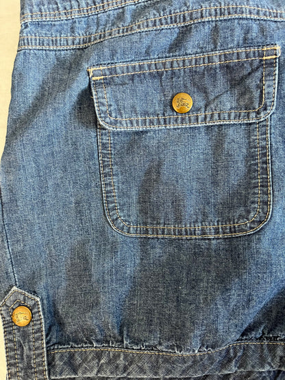 Blue denim romper with ruffles and frills